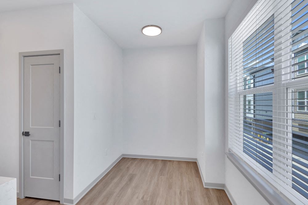 Kitchen nook with large window lighting and coat closet